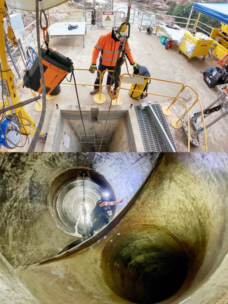 A worker is lowered into a tunnel shaft for welding repairs, as seen from both above and within the shaft.